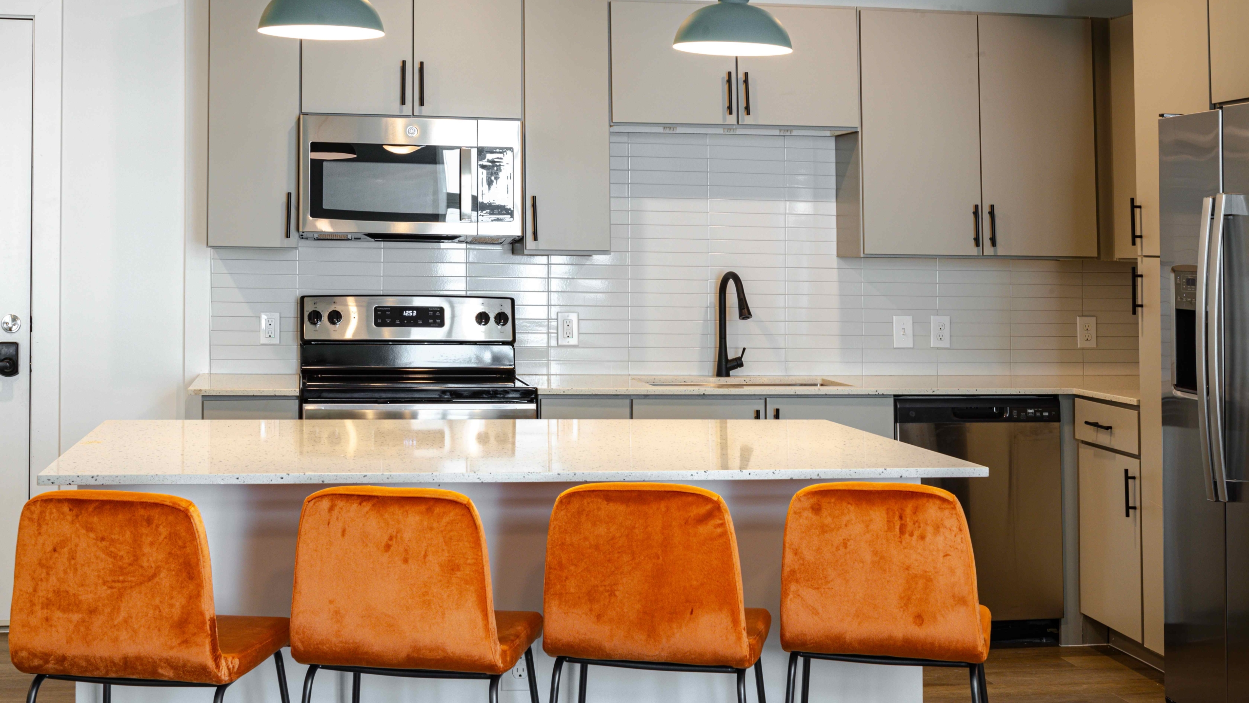 kitchen island and barstools at Rambler austin