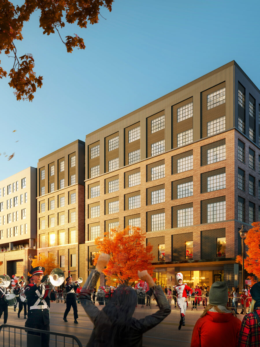 Rendering of the marching band at a parade outside the building of Rambler Columbus in fall.