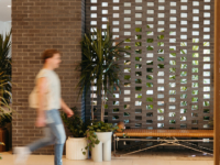 Moontower resident walking in the lobby space