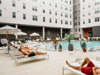 Wide view of students out at the pool at Rambler Athens
