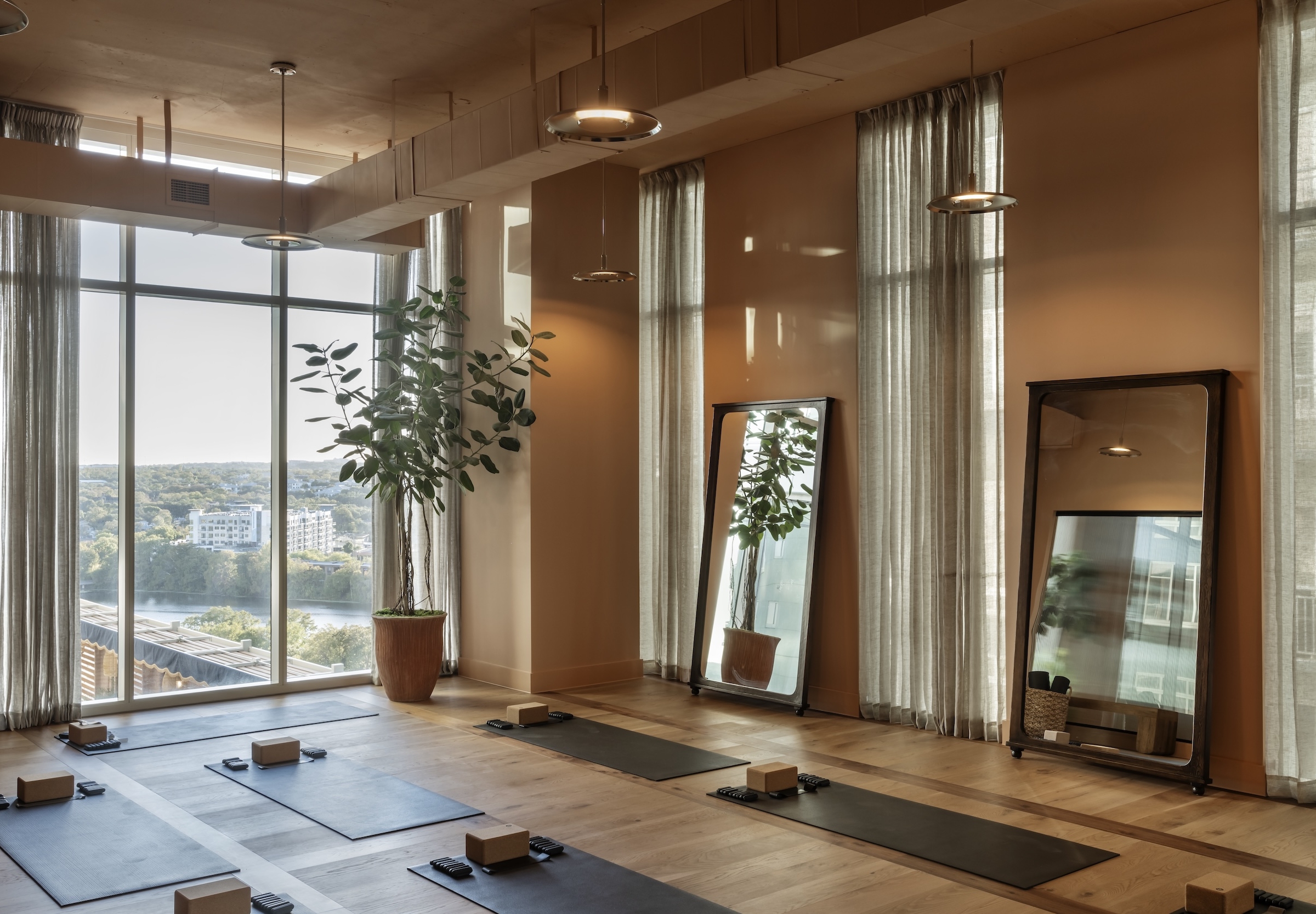 Yoga room at ROOST Rainey, Paseo ATX