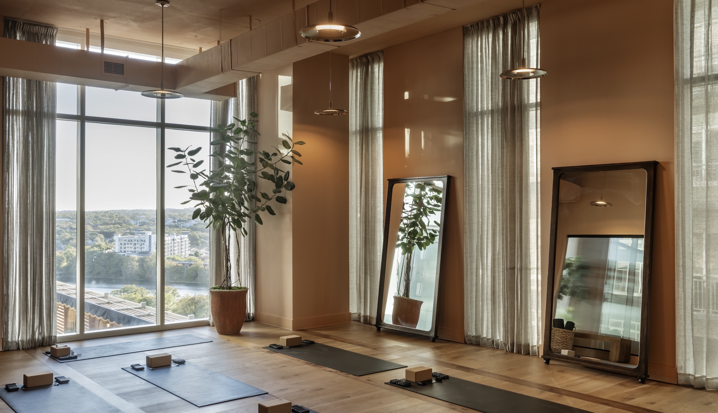 Yoga room at ROOST Rainey, Paseo ATX