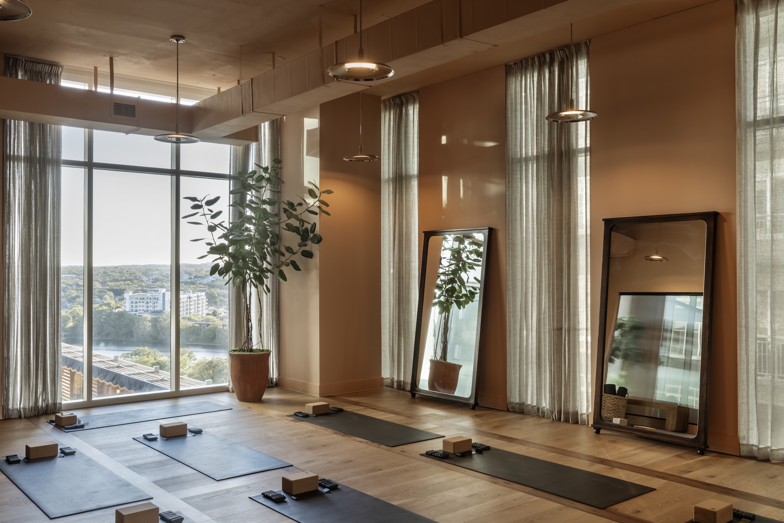 Yoga room at ROOST Rainey, Paseo ATX