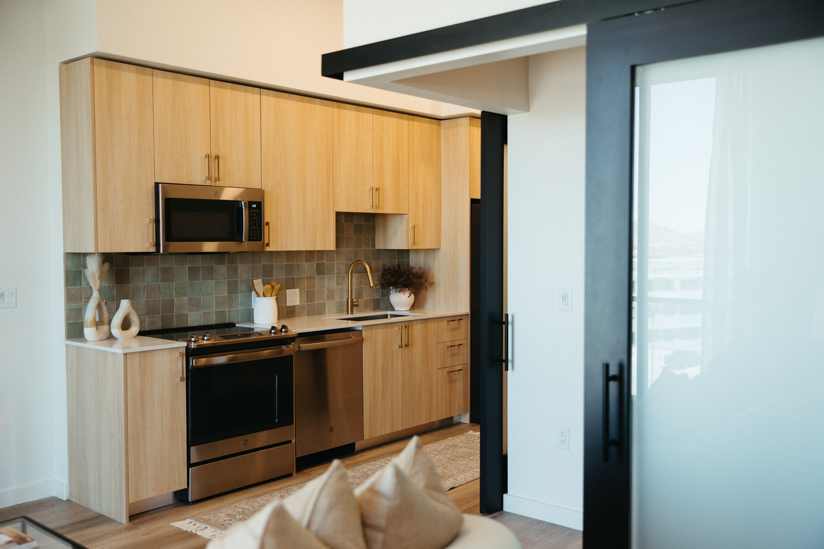 Kitchen in one bedroom model unit at Moontower
