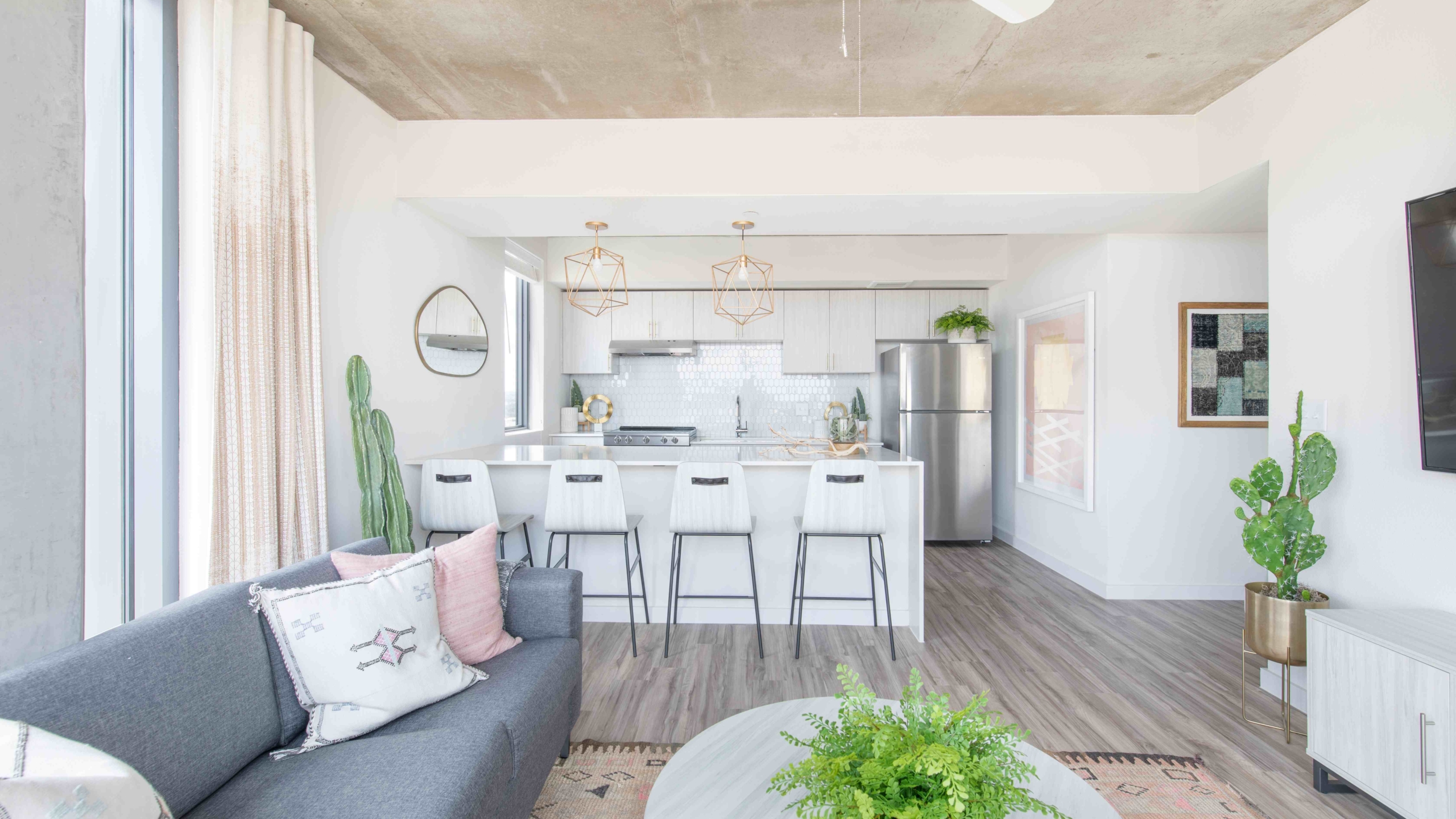 Kitchen and living area in Moontower's model unit