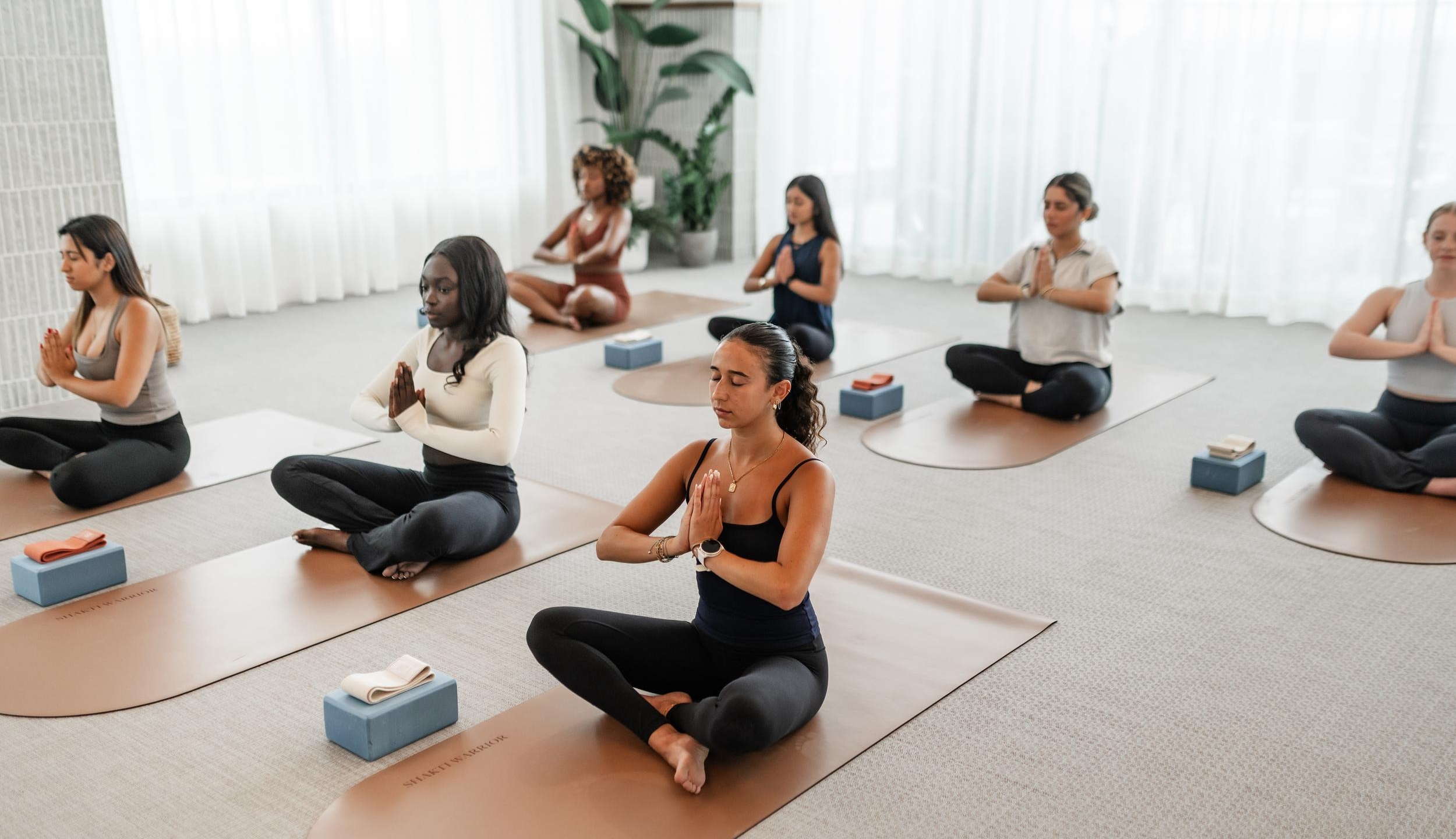 rambler atlanta yoga studio room meditating rooftop