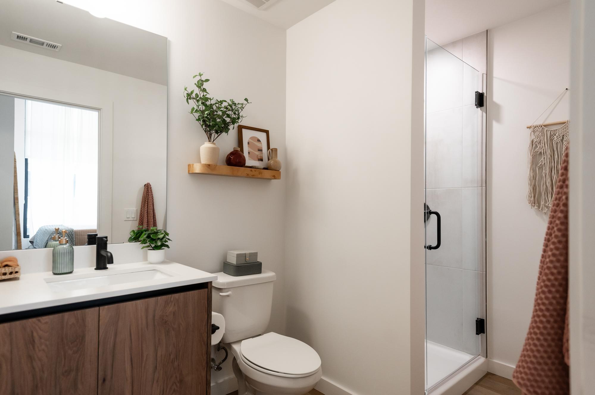 Representative bathroom with a stand-up shower at Rambler Atlanta