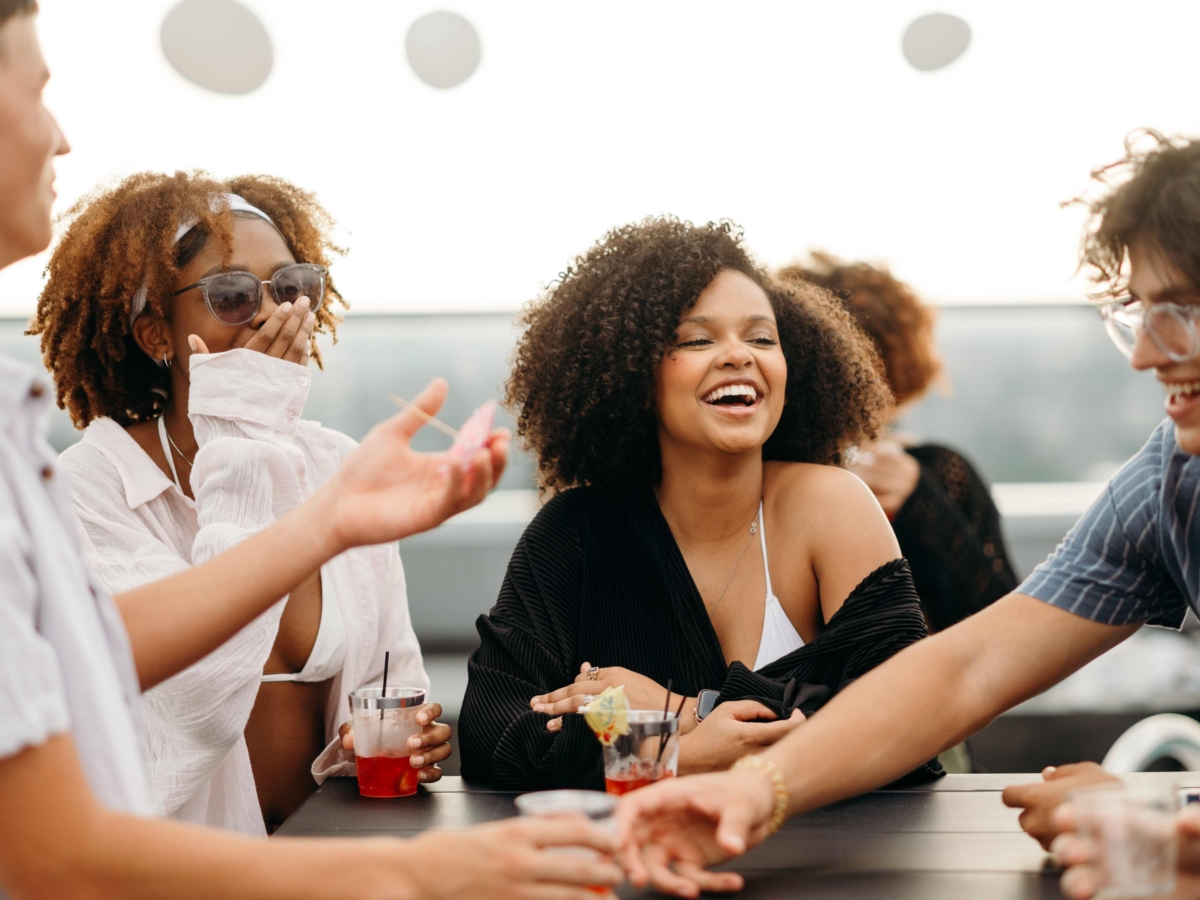 Friends laughing at whistler pool deck
