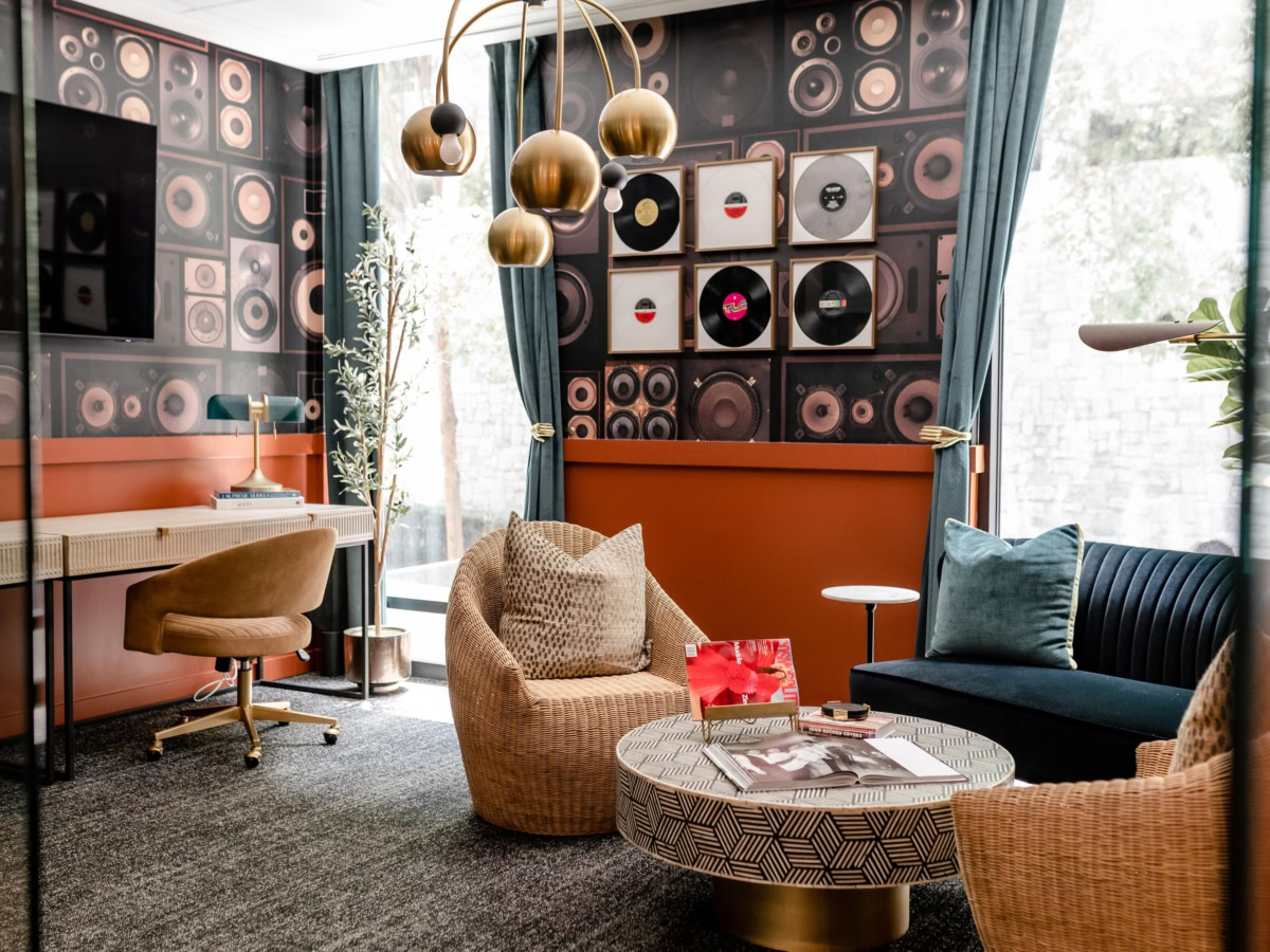 Podcast studio at Whistler, adorned with music-themed decor.