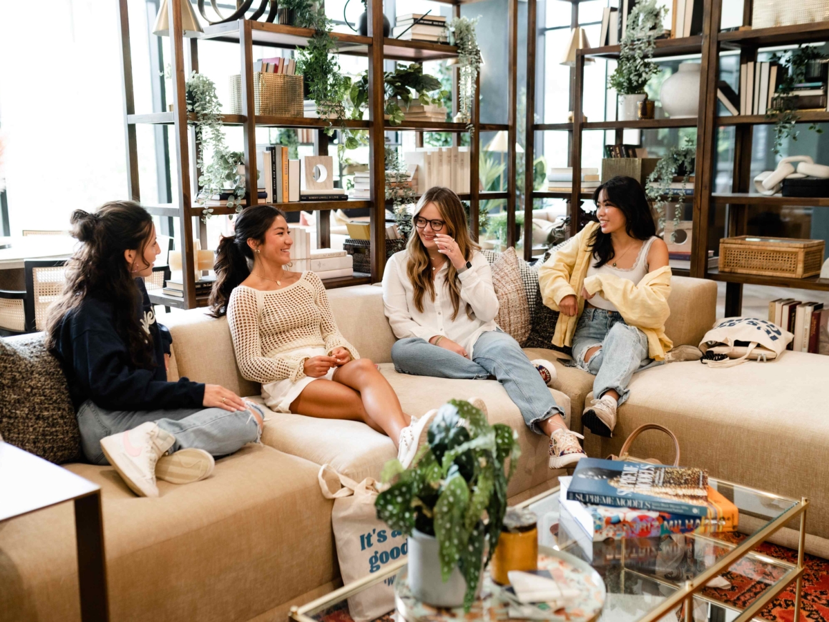 students talking in whistler lobby