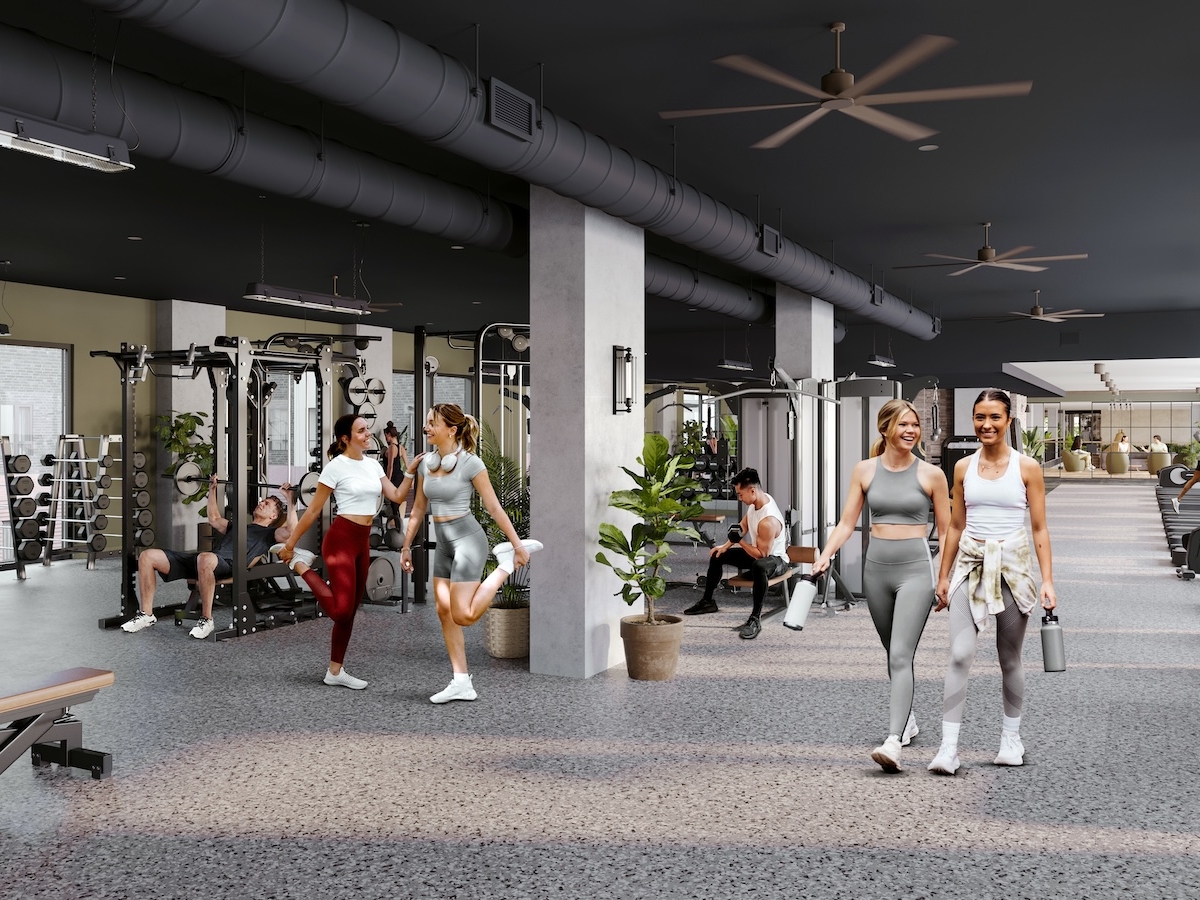 A group of people in a gym.