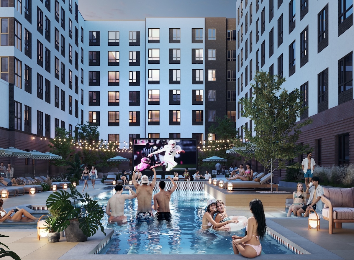 A modern apartment courtyard with a pool surrounded by people relaxing, swimming, and socializing. Large outdoor screen shows a sports game; string lights and plants create a lively, inviting atmosphere at dusk.