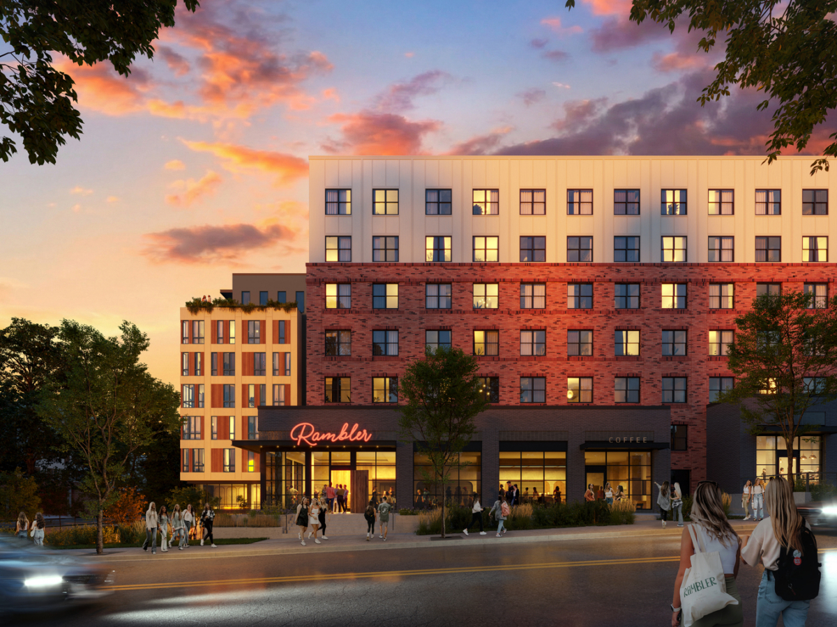 A modern multi-story apartment building called Rambler is shown at sunset, with warm lights glowing from windows, people walking outside, and trees framing the scene.